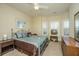 Bedroom with a light teal metal bed frame, a bay window, and vintage TV at 2032 Amenity Park Dr, Mount Pleasant, SC 29466