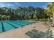 Community pool with lap lanes and lounge chairs, ideal for summer fun at 2032 Amenity Park Dr, Mount Pleasant, SC 29466