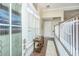 Welcoming foyer with decorative glass door, wood floors, and plantation shutters at 2032 Amenity Park Dr, Mount Pleasant, SC 29466