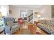 Cozy living room featuring hardwood floors, comfortable seating, and a warm atmosphere at 205 Seven Oaks Ln, Summerville, SC 29485