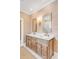 Bathroom with double vanity, marble countertop, and gold accents at 2204 Waterway Blvd, Isle of Palms, SC 29451