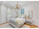 Charming bedroom with a queen-size bed and elegant decor at 2204 Waterway Blvd, Isle of Palms, SC 29451