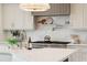 Bright kitchen with marble countertops and a gas range at 2281 Portside Way, Charleston, SC 29407