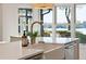 Kitchen features a farmhouse sink and a water view at 2281 Portside Way, Charleston, SC 29407