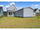 Spacious backyard with grass and a detached structure at 368 Trailmore Ln, Summerville, SC 29486