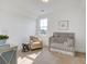 Charming Bedroom features a crib, comfy chair, and plenty of natural light at 368 Trailmore Ln, Summerville, SC 29486