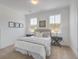 Bright bedroom with carpeted floors, a comfortable bed, and ample natural light at 368 Trailmore Ln, Summerville, SC 29486