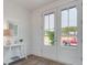 Bright entry with white double doors, a view of the backyard, and a small table at 368 Trailmore Ln, Summerville, SC 29486