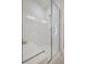 Clean white subway tile shower with glass enclosure and built-in seat at 368 Trailmore Ln, Summerville, SC 29486