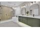 Elegant bathroom with double vanity, soaking tub, and walk-in shower at 373 Whispering Breeze Ln, Summerville, SC 29486