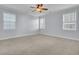 Bright bedroom featuring ample natural light and neutral carpeting at 373 Whispering Breeze Ln, Summerville, SC 29486