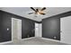 Bedroom with dark gray walls and neutral carpeting at 373 Whispering Breeze Ln, Summerville, SC 29486