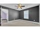 Simple bedroom with gray walls and a window with blinds at 373 Whispering Breeze Ln, Summerville, SC 29486