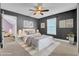 Cozy bedroom with gray walls and a white bed at 373 Whispering Breeze Ln, Summerville, SC 29486