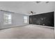 Spacious bonus room featuring neutral carpeting and a ceiling fan at 373 Whispering Breeze Ln, Summerville, SC 29486