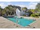 Sparkling community pool with a bathhouse nearby at 373 Whispering Breeze Ln, Summerville, SC 29486