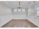 Spacious dining room with hardwood floors, chair rail and chandelier at 373 Whispering Breeze Ln, Summerville, SC 29486