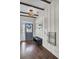 Entryway with hardwood floors and shiplap walls at 373 Whispering Breeze Ln, Summerville, SC 29486