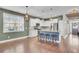 Open concept kitchen with island and stainless steel appliances at 373 Whispering Breeze Ln, Summerville, SC 29486