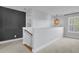 Spacious loft area with a large window and neutral decor at 373 Whispering Breeze Ln, Summerville, SC 29486