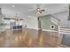Open living space with kitchen, living room, and hardwood floors at 373 Whispering Breeze Ln, Summerville, SC 29486