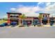 Brick retail buildings with outdoor seating and parking spaces at 373 Whispering Breeze Ln, Summerville, SC 29486