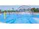 Colorful splash pad with rainbow arches and water features at 4126 Rising Tide Dr, Summerville, SC 29485