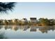 Couple canoeing on calm lake, homes in background at 428 Parish Farms Dr, Summerville, SC 29486