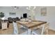 Kitchen dining area with farmhouse table and chairs at 432 Eva St, Moncks Corner, SC 29461