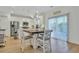 Modern kitchen with island, stainless steel appliances, and dining area at 432 Eva St, Moncks Corner, SC 29461