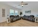 Relaxing living room featuring two reclining sofas and hardwood floors at 432 Eva St, Moncks Corner, SC 29461