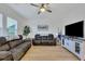 Living room with two sofas, hardwood floors, and a large TV at 432 Eva St, Moncks Corner, SC 29461