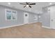 Spacious living room with light gray walls and wood floors at 5330 Halfway Creek Rd, Huger, SC 29450