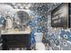 Stylish bathroom featuring bold floral wallpaper and a modern vanity at 656 Coleman Blvd # 405, Mount Pleasant, SC 29464