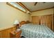 Spacious bedroom with wooden accents, large bed, and built-in closets at 8389 Chisolm Plantation Rd, Edisto Island, SC 29438