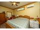 Bedroom with wooden furniture, ceiling fan, and plush carpeting at 8389 Chisolm Plantation Rd, Edisto Island, SC 29438