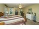 Bedroom featuring wood bedframe, dressers, and carpeted floor at 8389 Chisolm Plantation Rd, Edisto Island, SC 29438