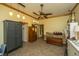 Bonus room with tile flooring, ceiling fan, and various furnishings at 8389 Chisolm Plantation Rd, Edisto Island, SC 29438