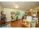 Living room with sofas, a patterned chair, and wood parquet floors at 8389 Chisolm Plantation Rd, Edisto Island, SC 29438