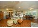 Living room with kitchen and dining area in the background at 8389 Chisolm Plantation Rd, Edisto Island, SC 29438