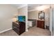 Ensuite bathroom with a soaking tub, vanity, and a glimpse of the main bedroom at 107 Deer Run Ct, Goose Creek, SC 29445