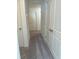 Hallway with plush carpeting leading to bedrooms at 1101 Scarlett Maple St, Summerville, SC 29486