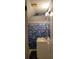 Bathroom with vanity, shower, and fish-themed decor at 141 Wintergreen Rd, Walterboro, SC 29488