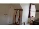 Bedroom with a full-length mirror, closet, and window with blinds at 141 Wintergreen Rd, Walterboro, SC 29488