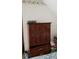 Bedroom with wooden dresser and other personal items at 141 Wintergreen Rd, Walterboro, SC 29488