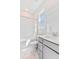 Clean and well-lit bathroom with grey vanity, white tub, and tiled floor at 1445 Clay Field Trl, Summerville, SC 29485