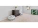Unfurnished bedroom with carpet, dresser, cushioned seats, and decor at 1445 Clay Field Trl, Summerville, SC 29485