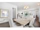 Dining room with view to the kitchen and living area at 1445 Clay Field Trl, Summerville, SC 29485