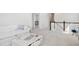 Open loft with comfortable seating and a view of the staircase at 1445 Clay Field Trl, Summerville, SC 29485