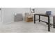 Inviting home office with plush chair, wooden desk, and stylish wall art at 1445 Clay Field Trl, Summerville, SC 29485